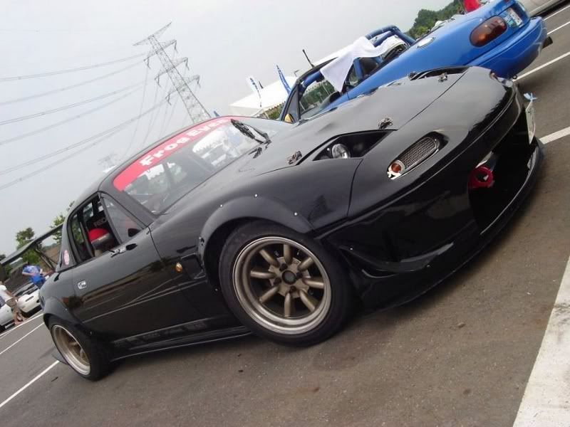 a black turbo mk1 mx5 with